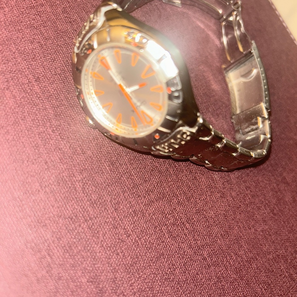 Elegant Silver Watch with Orange Dial